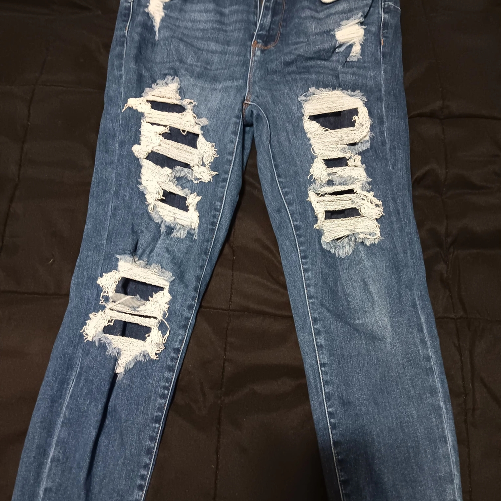 Blue Skinny Jeans with Distressed Details